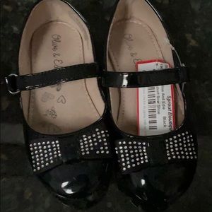 Olive and Edie black patent leather shoes